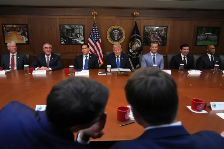 Trump hails a ‘unique’ Cabinet meeting at Camp David as he seizes on Spain’s migration crisis